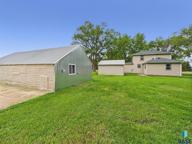 45390 284th St, Hurley, SD 57036 - view of grassy yard with an outdoor structure and an outbuilding