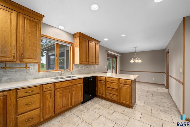 4704 S Pasque Cir, Sioux Falls, SD 57105 - kitchen featuring a sink, black dishwasher, tasteful backsplash, plenty of natural light, and recessed lighting