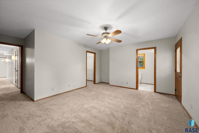 909 E 64th St, Sioux Falls, SD 57108 - unfurnished room with light carpet, ceiling fan, and baseboards