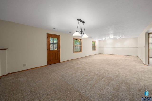 909 E 64th St, Sioux Falls, SD 57108 - unfurnished room featuring carpet floors and baseboards