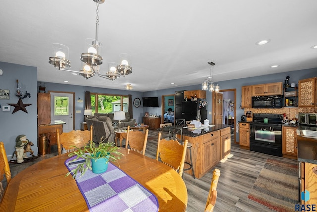 48484 262nd St, Valley Springs, SD 57068 - dining room with a chandelier, light wood-style floors, and recessed lighting