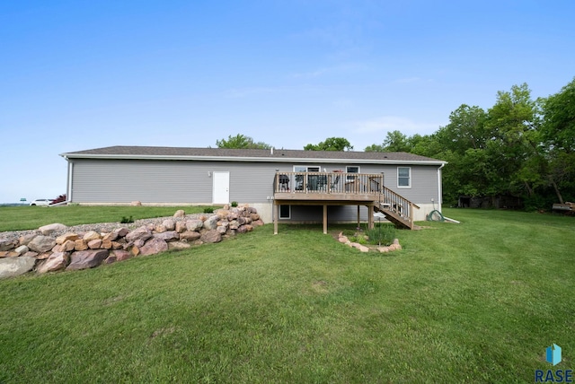 48484 262nd St, Valley Springs, SD 57068 - back of house featuring a deck, stairs, and a lawn