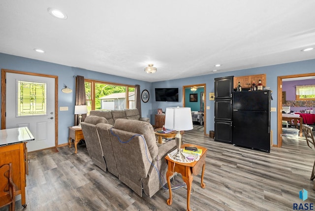 48484 262nd St, Valley Springs, SD 57068 - living room featuring light wood finished floors, recessed lighting, and baseboards