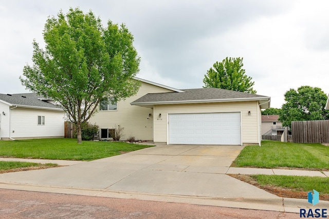 4436 W Briggs Dr, Sioux Falls, SD 57107 - tri-level home with a garage and concrete driveway