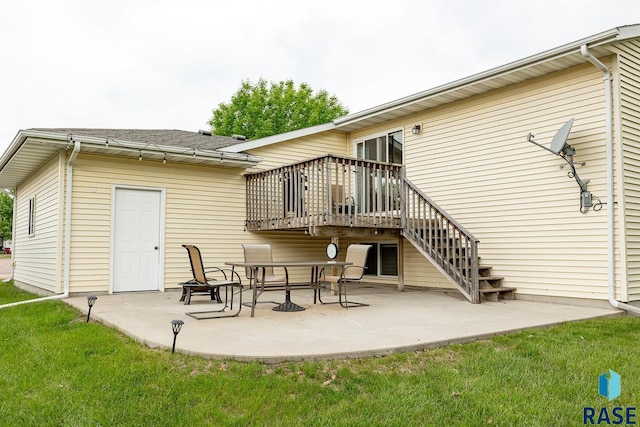 4436 W Briggs Dr, Sioux Falls, SD 57107 - back of property featuring a patio area, a deck, stairs, and a shingled roof