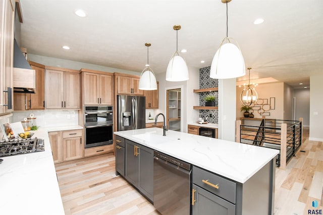 6504 E Hawker Trl, Sioux Falls, SD 57110 - kitchen with stainless steel appliances, a sink, light wood-style floors, decorative backsplash, and gray cabinets