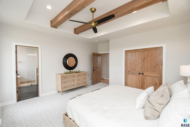 6504 E Hawker Trl, Sioux Falls, SD 57110 - bedroom featuring recessed lighting, a raised ceiling, light carpet, connected bathroom, and baseboards