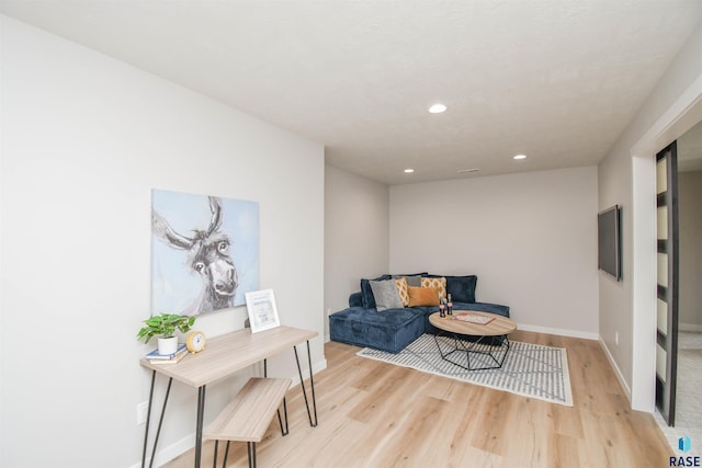 6504 E Hawker Trl, Sioux Falls, SD 57110 - sitting room with light wood-style flooring, recessed lighting, and baseboards