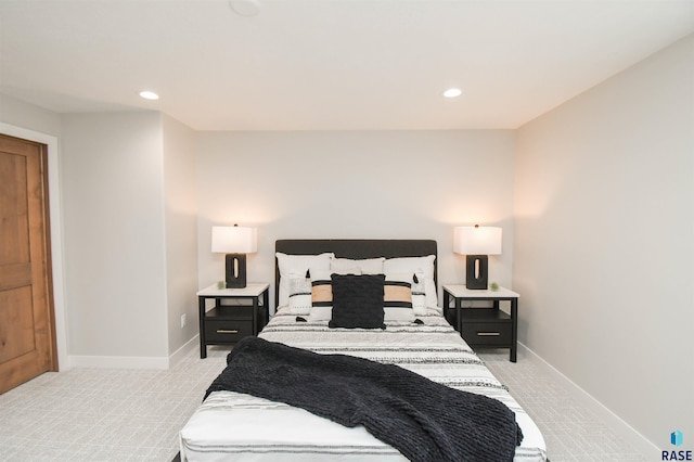 6504 E Hawker Trl, Sioux Falls, SD 57110 - bedroom with light carpet, baseboards, and recessed lighting