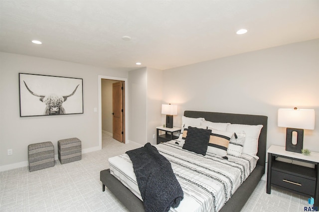 6504 E Hawker Trl, Sioux Falls, SD 57110 - bedroom featuring light colored carpet, recessed lighting, and baseboards