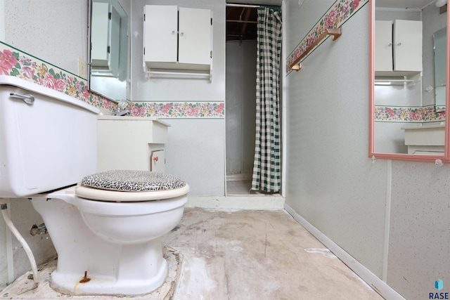6905 W 6th St, Sioux Falls, SD 57107 - full bathroom with toilet, a shower with shower curtain, concrete flooring, and baseboards