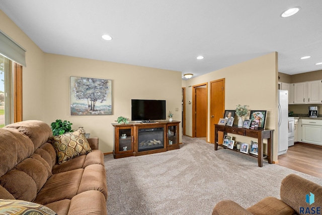 4401 E 28th St, Sioux Falls, SD 57103 - living area featuring recessed lighting and light carpet