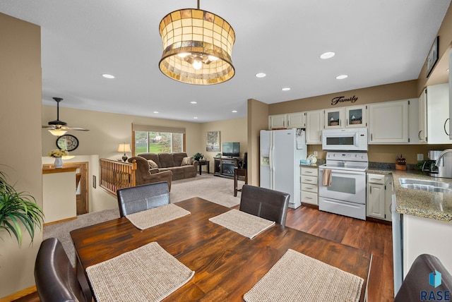 4401 E 28th St, Sioux Falls, SD 57103 - dining space featuring dark wood-style flooring, recessed lighting, and ceiling fan