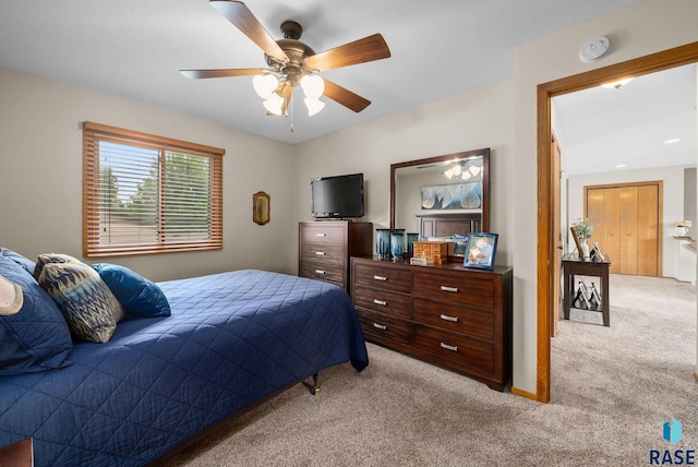 4401 E 28th St, Sioux Falls, SD 57103 - bedroom with light carpet and ceiling fan