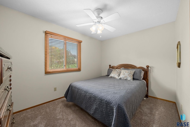 4401 E 28th St, Sioux Falls, SD 57103 - bedroom with carpet, baseboards, and ceiling fan