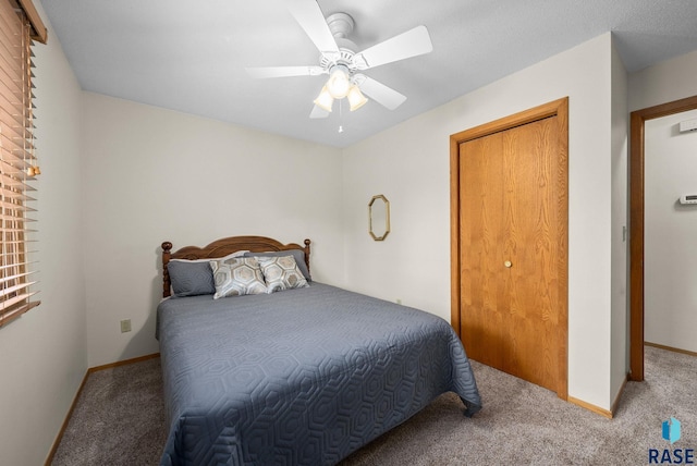 4401 E 28th St, Sioux Falls, SD 57103 - bedroom with carpet flooring, baseboards, and ceiling fan