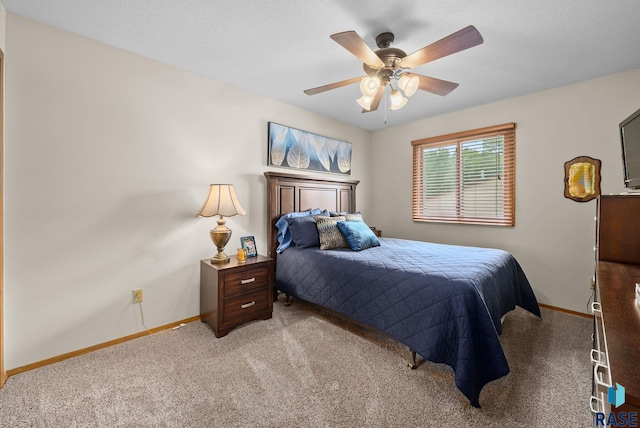 4401 E 28th St, Sioux Falls, SD 57103 - bedroom with baseboards, light colored carpet, and ceiling fan