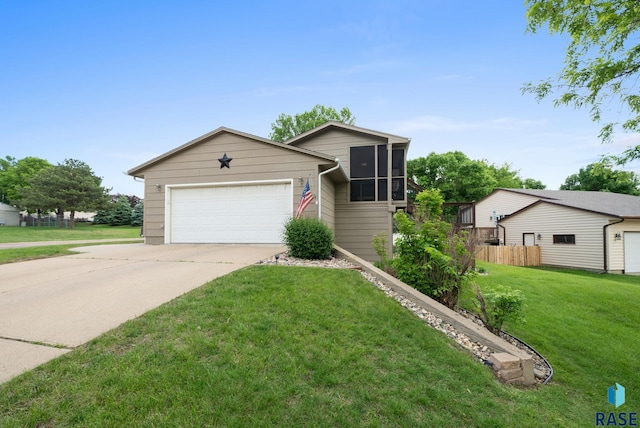 4401 E 28th St, Sioux Falls, SD 57103 - view of front of home featuring concrete driveway and a garage