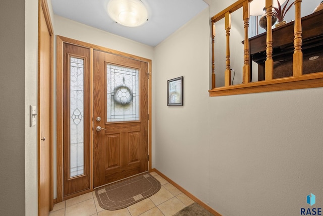 4401 E 28th St, Sioux Falls, SD 57103 - entrance foyer with baseboards and light tile patterned floors
