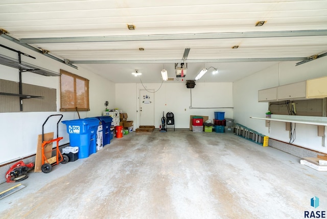 4401 E 28th St, Sioux Falls, SD 57103 - garage featuring a garage door opener