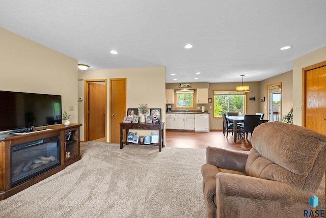4401 E 28th St, Sioux Falls, SD 57103 - living area featuring recessed lighting and light colored carpet