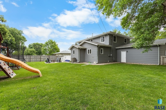 4804 W 39th St, Sioux Falls, SD 57106 - back of house featuring a playground