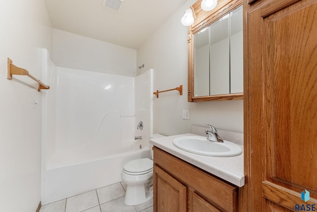 201 N Foss Ave, Sioux Falls, SD 57110 - bathroom featuring vanity, bathing tub / shower combination, toilet, and tile patterned floors