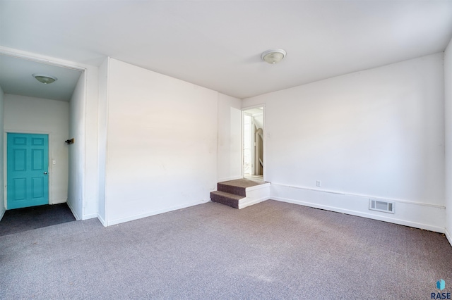 316 S Sherman Ave, Sioux Falls, SD 57103 - empty room featuring dark carpet and baseboards