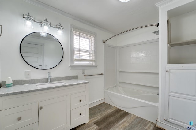 316 S Sherman Ave, Sioux Falls, SD 57103 - bathroom featuring vanity, shower / tub combination, wood finished floors, and crown molding