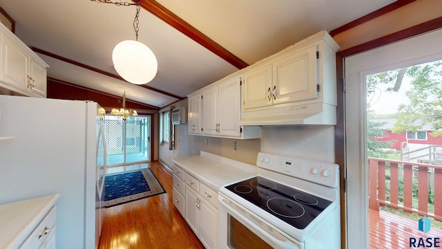 1024 Orchard Dr, Brookings, SD 57006 - kitchen featuring white appliances, under cabinet range hood, light wood-style flooring, light countertops, and a chandelier