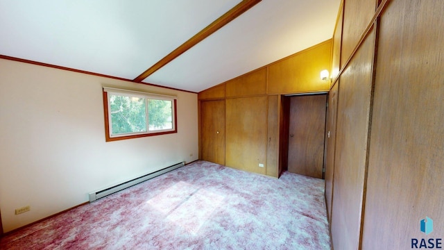 1024 Orchard Dr, Brookings, SD 57006 - unfurnished bedroom featuring a baseboard heating unit, lofted ceiling, light colored carpet, and a closet