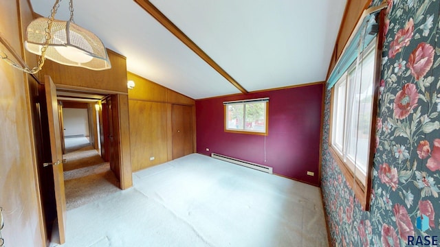 1024 Orchard Dr, Brookings, SD 57006 - unfurnished bedroom with a baseboard radiator, carpet flooring, vaulted ceiling, and a closet