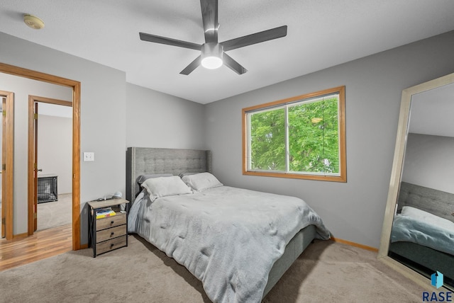 800 N Poplar Ave, Tea, SD 57064 - bedroom with carpet flooring and a ceiling fan