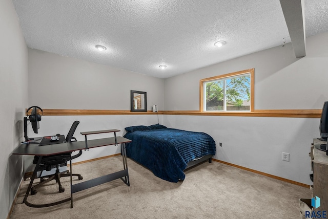 800 N Poplar Ave, Tea, SD 57064 - carpeted bedroom featuring a textured ceiling, baseboards, and an office area