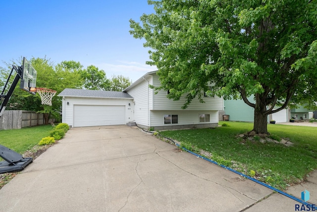 800 N Poplar Ave, Tea, SD 57064 - view of side of home featuring a garage and driveway