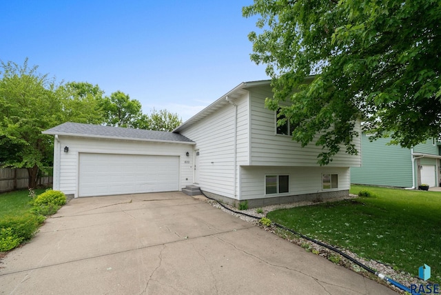 800 N Poplar Ave, Tea, SD 57064 - view of side of home with concrete driveway and a garage
