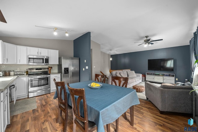 800 N Poplar Ave, Tea, SD 57064 - dining room featuring lofted ceiling, a ceiling fan, and dark wood finished floors