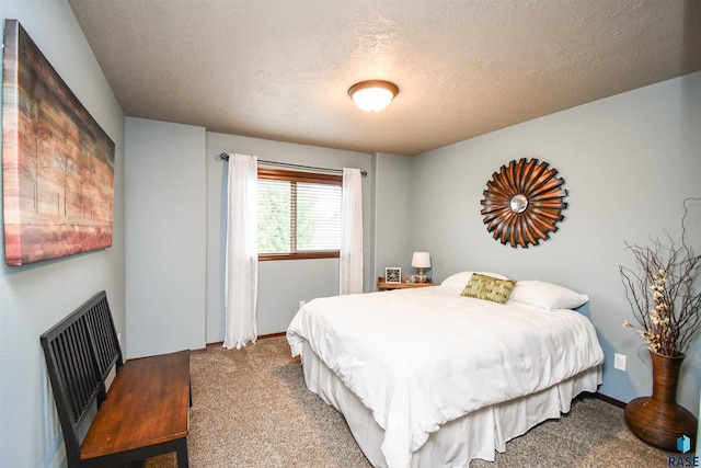 5411 S Ledgestone Pl, Sioux Falls, SD 57108 - bedroom with a textured ceiling and carpet
