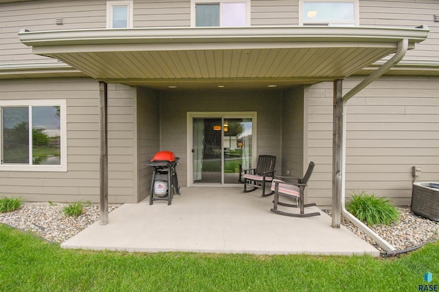 5411 S Ledgestone Pl, Sioux Falls, SD 57108 - entrance to property with a patio and cooling unit
