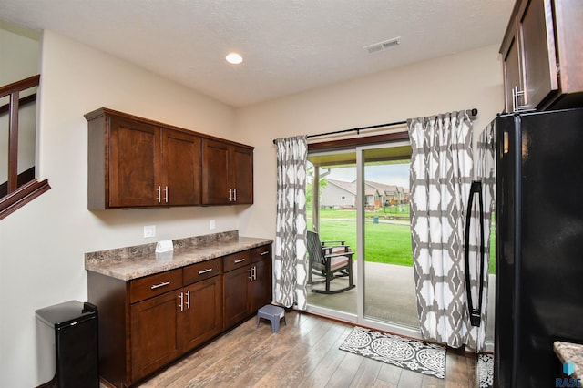 5411 S Ledgestone Pl, Sioux Falls, SD 57108 - bar area featuring freestanding refrigerator, light wood-type flooring, and recessed lighting