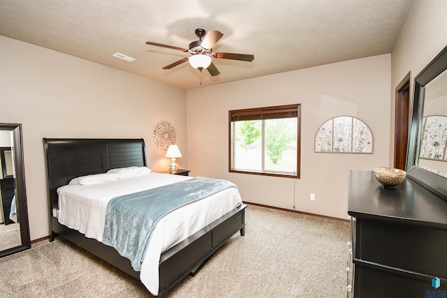 5411 S Ledgestone Pl, Sioux Falls, SD 57108 - bedroom with light carpet, baseboards, and a ceiling fan