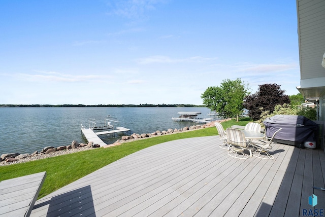 200 Best Point Dr, Madison, SD 57042 - deck featuring a water view, a dock, and area for grilling