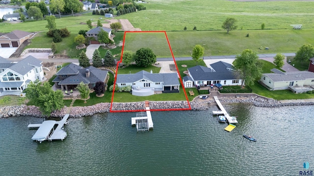 200 Best Point Dr, Madison, SD 57042 - aerial view of residential area featuring a nearby body of water and property parcel outlined