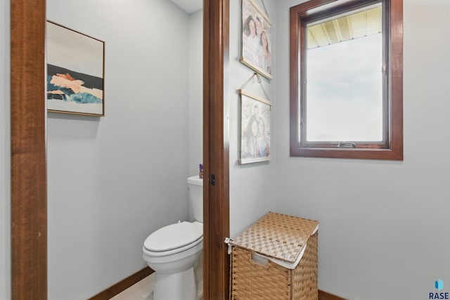 26646 461st Ave, Hartford, SD 57033 - bathroom featuring toilet and baseboards