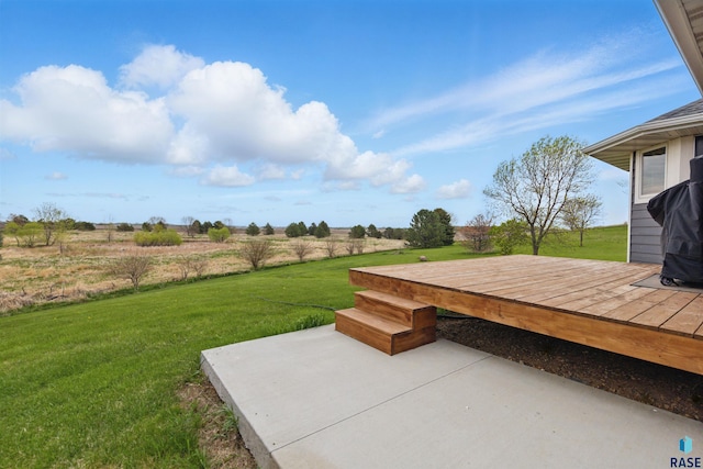 26646 461st Ave, Hartford, SD 57033 - view of green lawn featuring a patio, a deck, and a view of rural / pastoral area