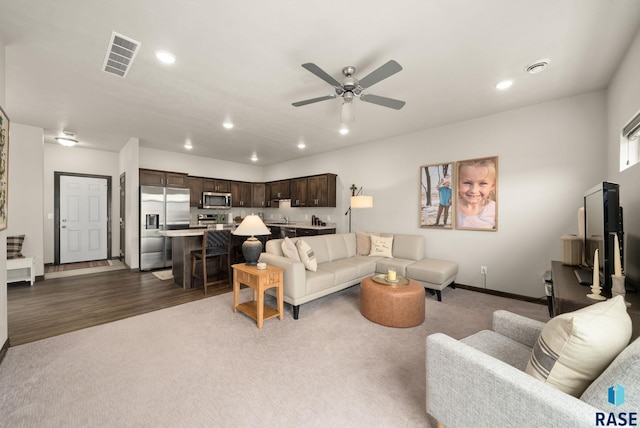 9054 W Ark Pl, Sioux Falls, SD 57106 - living room with recessed lighting, ceiling fan, baseboards, and wood finished floors