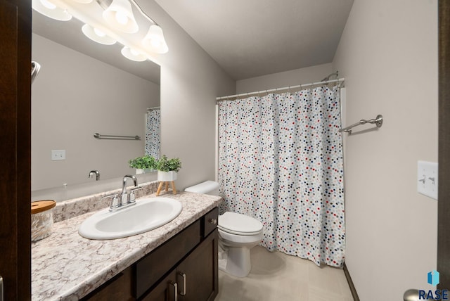 9054 W Ark Pl, Sioux Falls, SD 57106 - full bath with vanity, toilet, and a shower with shower curtain