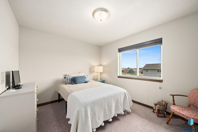 9054 W Ark Pl, Sioux Falls, SD 57106 - carpeted bedroom featuring baseboards