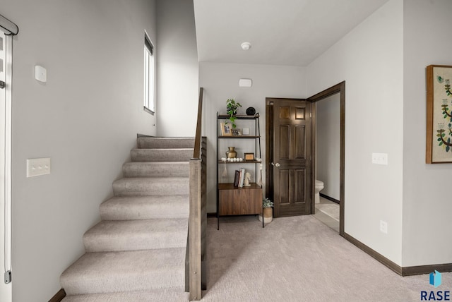 9054 W Ark Pl, Sioux Falls, SD 57106 - stairs with carpet floors and baseboards