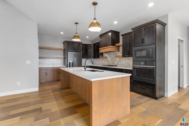 7324 E Twin Pines Ct, Sioux Falls, SD 57110 - kitchen with black appliances, a sink, open shelves, tasteful backsplash, and light countertops
